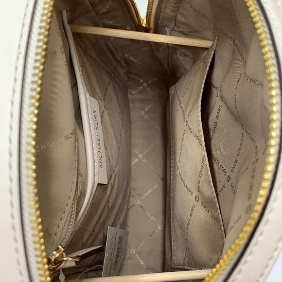 Michael Kors Jaycee Medium Pebbled Leather Backpack
Light Cream - Picture 11 of 13